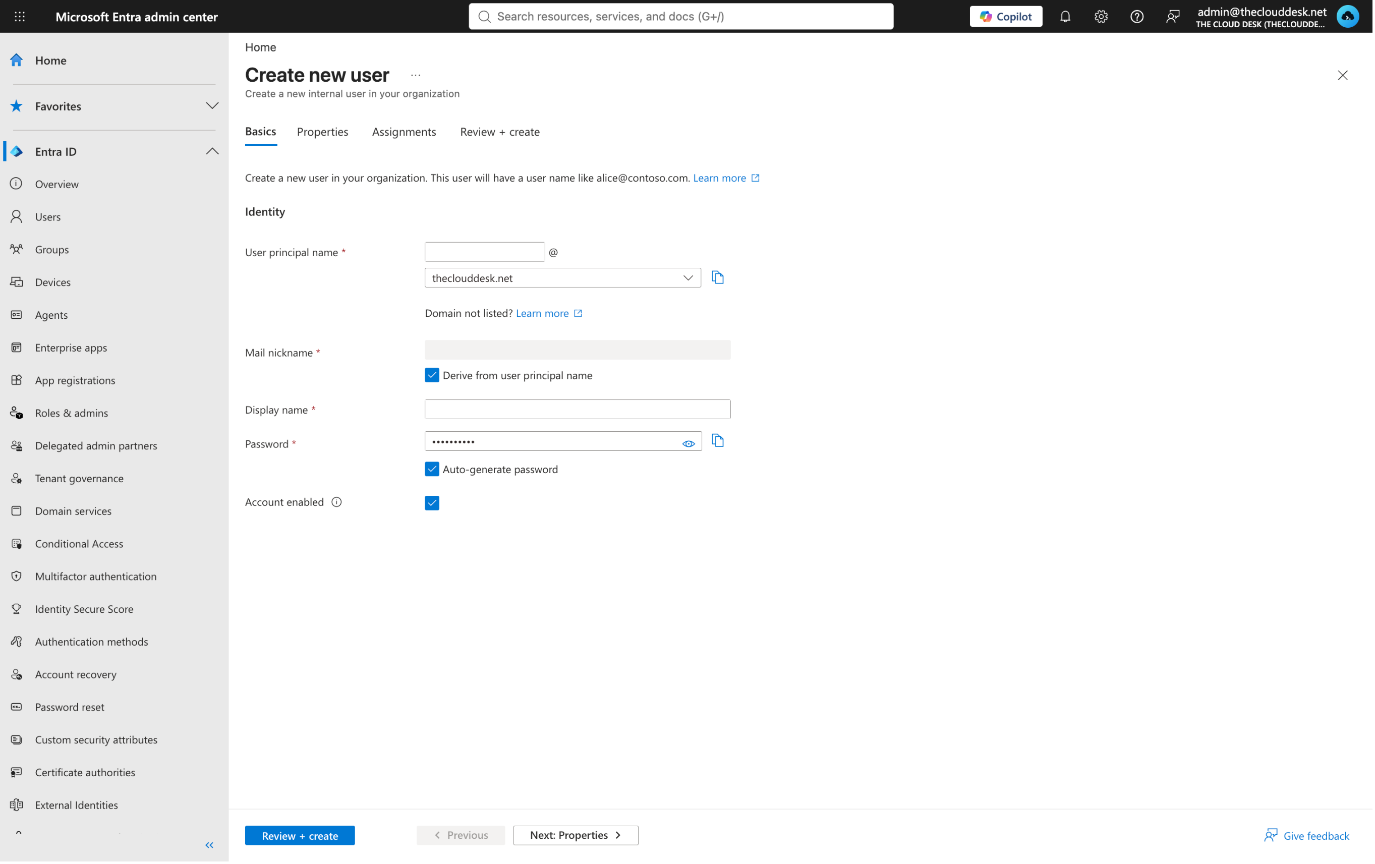 The Create new user panel, Basics tab, showing User principal name with a domain dropdown, Mail nickname, Display name, Password and Account enabled.