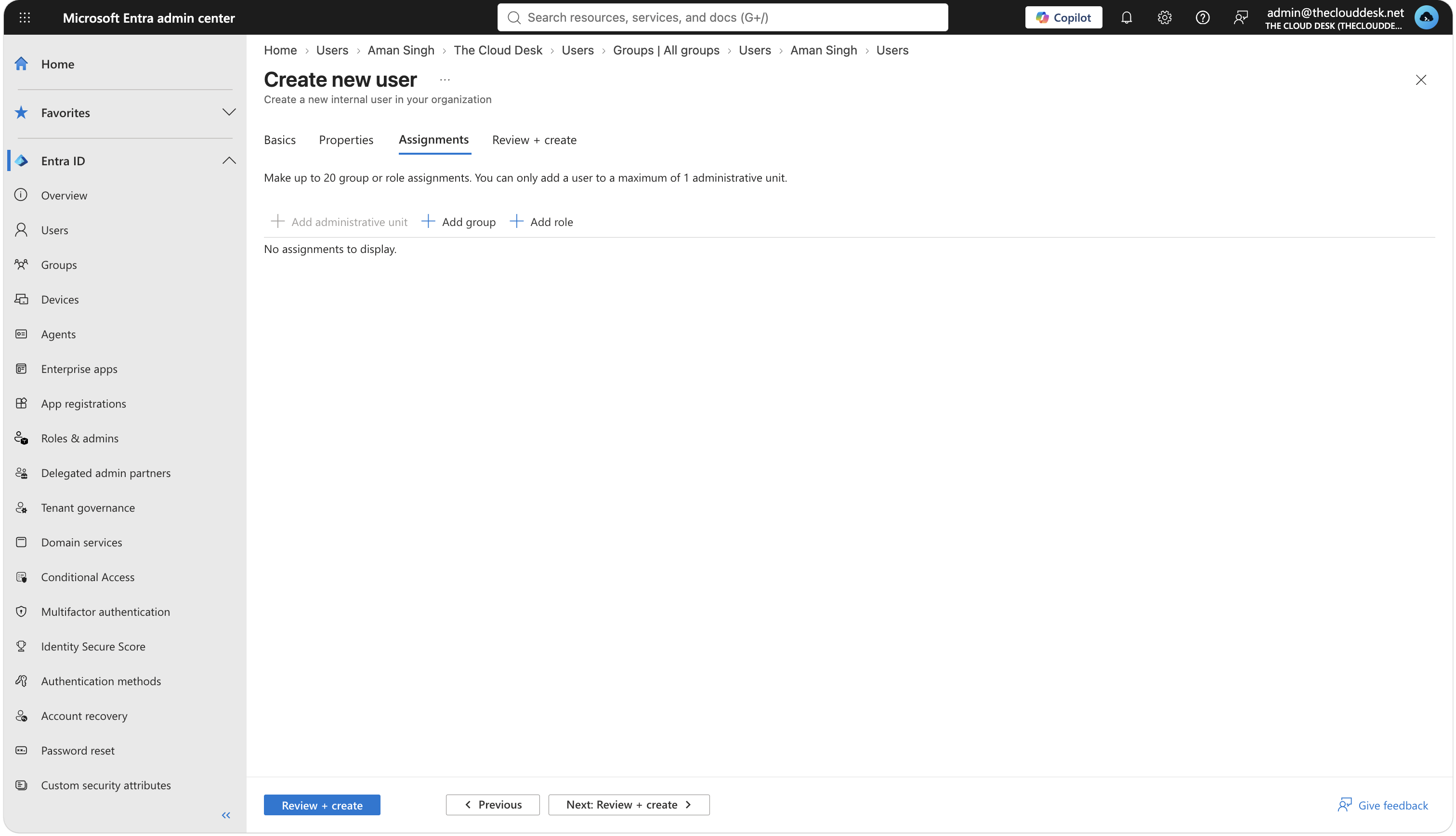The Assignments tab of the Create new user panel, with Add administrative unit, Add group and Add role, and no assignments listed.