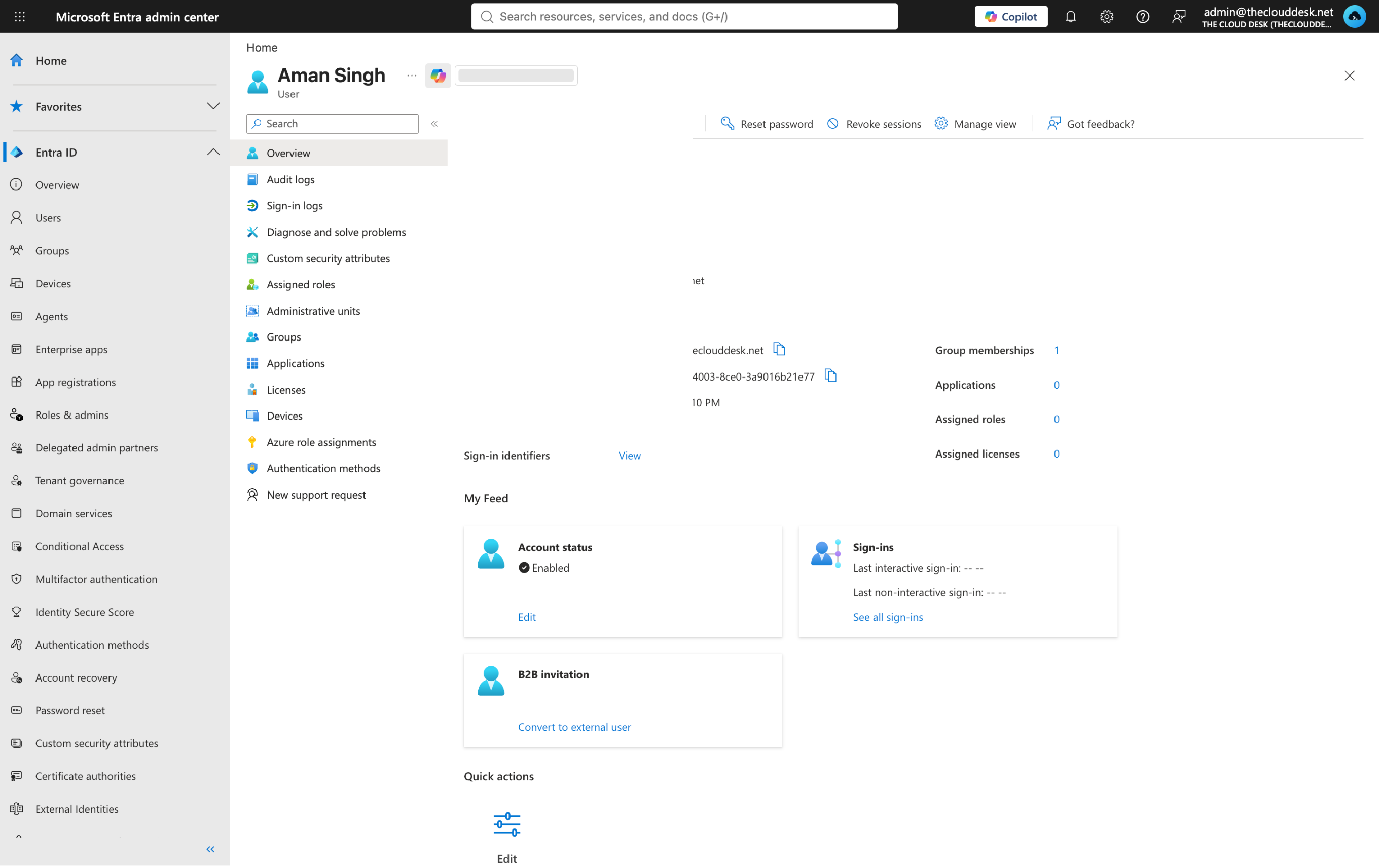 A user's profile page showing user principal name, object ID, created date, user type, and counts for group memberships, applications, assigned roles and licences.