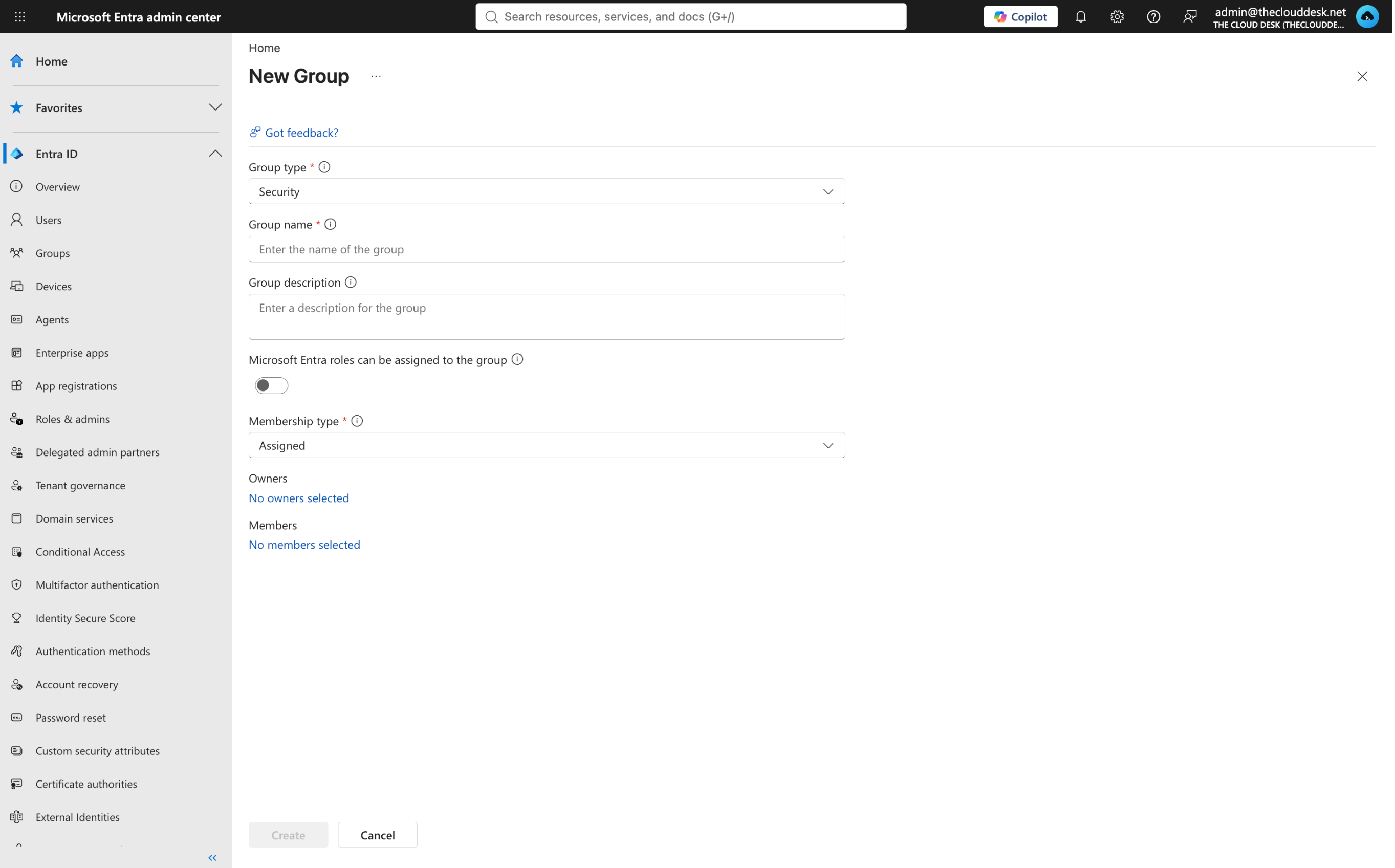 The New Group panel showing Group type, Group name, Group description, the Entra roles toggle, Membership type, Owners and Members.